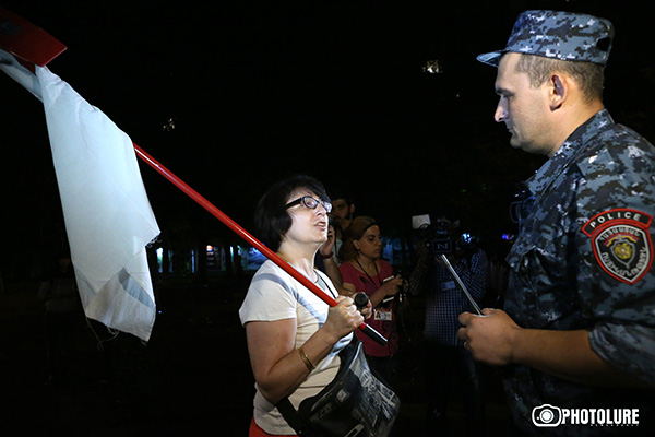 On the 13th day of the occupation of Patrol-Guard Service Regiment of Erebuni district by 'Sasna Tsrer' group, protesting people clashed with policemen in Khorenatsi street. Some people were arrested